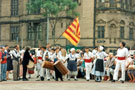 View: t04782 Lei Courcoussoun Dance Group from France performing in Fargate during the Cultural Festival with the Town Hall in the background