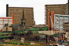 Demolition of one block of Hyde Park Flats showing St. Johns Church
