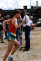 The World Student Games Flame arrives to be carried by a local athlete from Hallamshire Harriers 