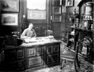 J. G. Graves in his office