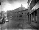Arundel Street from Eyre Lane, Nos. 33 - 37 John May (Sheffield) Ltd., Vulcan Works, cane furniture and basket maker, right, Adelphi public house in the distance