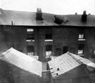 Possibly taken from Paget Street playground looking towards the rear of Alfred Road showing damage to roof Possibly taken from Paget Street playground looking towards the rear of Alfred Road showing damage to roof