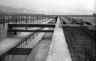 View: u00980 Main feed conduit, Blackburn Meadows sewage treatment works, looking towards Hill Top Kimberworth