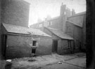 Court off Lock Street. Back to back houses in Court No. 1, Lock Street, over wall