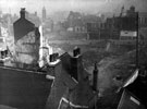 Looking towards Angel Street and Castle Street (left), cleared after air raid, World War II