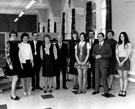 Staff including, Edwin Speight (3rd right), John Bebbington (5th left), City Librarian, Robert Atkins (4th right), David Bramley (3rd right) and Edna Jessop (2nd from right), Secretary to City Librarian,  Upperthorpe Branch Library
