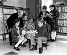 Councillor Mrs Enid Hattersley, chairman of Libraries and Arts Committee, John Bebbington, City Librarian with children, Upperthorpe Branch Library at the official opening