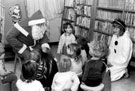 Father Christmas visiting children at Gleadless Library
