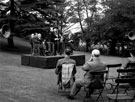 Lord Mayor, Alderman Mrs Grace Tebbutt speaking at the opening day ceremony at Ecclesall Library, Knowle Lane, former Weetwood House (group includes J.P. Lamb, City Librarian, on left)