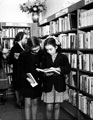 Two girls studying a book in the Junior Section, Ecclesall Library (former Weetwood House), Knowle Lane