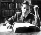 View: u01380 Boy studying in the Central Reference Library, Central Library, Surrey Street