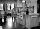 View from West end of room (front of building) showing rear of enclosure, Woodhouse Branch Library, Tannery Street (after alterations in 1954) View from West end of room (front of building) showing rear of enclosure, Woodhouse Branch Library, Tannery Street (after alterations in 1954)
