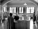 View from West end of room (front of building) over enclosure, Woodhouse Branch Library, Tannery Street (after alterations in 1954) View from West end of room (front of building) over enclosure, Woodhouse Branch Library, Tannery Street (after alterations in 1954)