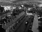 Elevated view showing rear of housing on Woodgrove Lane (left), Fawley Road (centre bottom), Penistone Road (centre left to right) and Hobson Avenue and Easterbrook Allcard and Co. Ltd., Albert Works (left) and Weirhead Iron Foundry (centre top)