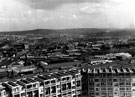 Elevated view from Hyde Park Flats looking towards the Industrial Don Valley and Wincobank Hill, showing Attercliffe Road Station and Park Iron Works (centre left before the 3 arched viaduct) and College of Technology Department (centre right)