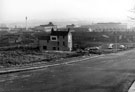 Carwood Road looking across demolished housing sites to Hallcar Tavern (centre), Carwood Terrace and housing beyond Carwood Road looking across demolished housing sites to Hallcar Tavern (centre), Carwood Terrace and housing beyond
