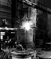 Steel being teemed into vacuum treatment unit which can accommodate ingots up to 210 tons in wieght, British Steel Corporation Steel being teemed into vacuum treatment unit which can accommodate ingots up to 210 tons in wieght, British Steel Corporation