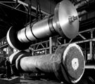 Solid forged shafts for hydro-electric generating plant. Over 19ft. (5.8m) long, the shafts weigh 61 tons, have a body diameter of 49 in (124cm), collars 81 1/2 in (207cm) and 93 1/2 in (237cm) diameter at either end, English Steel Corporation Solid forged shafts for hydro-electric generating plant. Over 19ft. (5.8m) long, the shafts weigh 61 tons, have a body diameter of 49 in (124cm), collars 81 1/2 in (207cm) and 93 1/2 in (237cm) diameter at either end, English Steel Corporation