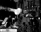 Removing part-forged crankshaft from continuous grain flow (C.G.F.) machine, British Steel Corporation Removing part-forged crankshaft from continuous grain flow (C.G.F.) machine, British Steel Corporation