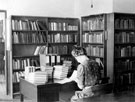 Central Library, Surrey Street. Book Stocks and Cataloguing Department, Miss Martin prepares Plat Reading Books