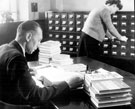 Central Library, Surrey Street. Book Stocks and Cataloguing Department, Chief Cataloguer and Staff in Union Room Central Library, Surrey Street. Book Stocks and Cataloguing Department, Chief Cataloguer and Staff in Union Room