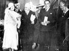 Royal visit of Elizabeth, the Duchess of York, as she arrives to officially open Central Library and Graves Art Gallery. Group includes Lord Mayor, Fred Marshall, behind the Duchess, and Joseph Percy Lamb, City Librarian 1929-1956, right