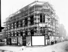 Central Library under construction, junction of Surrey Street and Tudor Street, on site of former Central Reference Library and Mechanics' Institute. Old Central Lending Library and Music Hall in background