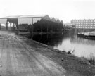View: u02308 Timber dock at Sheffield Canal Basin, with Straddle Warehouse in background