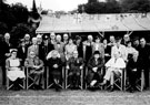 Unidentified occasion, possibly V.I.P.'s at a Sports Day. Group includes Grace Tebbutt, front row, 3rd right, Coun. G. B. Tomlin and Mrs Tomlin, centre row, extreme right Unidentified occasion, possibly V.I.P.'s at a Sports Day. Group includes Grace Tebbutt, front row, 3rd right, Coun. G. B. Tomlin and Mrs Tomlin, centre row, extreme right