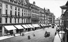 View: u02340 Fargate including No. 34 Richard Field and Son Ltd., tea merchants and Fields Continental Cafe and Nos. 16 - 30 Robert Proctor and Son, drapers