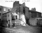 Demolition of properties on St. Mary's Lane. No. 65 former premises of L.M.H. Manufacturing Co., cutlery manufacturers on corner. Remains of Court No 4, right