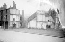 Demolition of premises on Hermitage Street. Remains of Court 8, known as Grey Hound Yard, in background and Court 6 in foreground. No 38, former Greyhound Tavern, remains on left