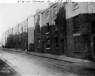 Back to back houses, Nos 81-103, Trafalgar Street, prior to demolition. Court No. 5 at rear of houses in foreground