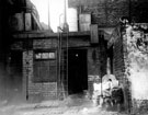 Butchers Yard at rear of Thomas Street, looking towards wall of Court No. 27, Thomas Street. Probably the yard of Edward Wild and Son Ltd., Cold Storage