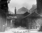 Probably Court 17, off Trafalgar Street, looking towards side of Moore and Wright, Engineers Tool Manufacturers (with gable). Not Button Lane as stated