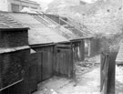 Outbuildings off Court 8, Button Lane, rear of former Wentworth House public house Three windows belonging to Moore and Wright, Engineers Tool Manufacturers in background, left
