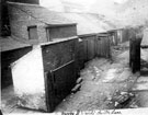 Outbuildings off Court 8, Button Lane, rear of former Wentworth House public house Three windows belonging to Moore and Wright, Engineers Tool Manufacturers in background, centre