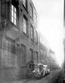 Backfields from outside No. 5, the former premises of William Wilson and Son, Carriage Works. Further premises on left include rear of Cambridge Street Horn Works and Brook Bros., Albert Works
