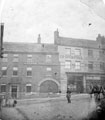 View: u02720 Travellers' Inn, Snig Hill, with shops belonging to Sheffield Co-operative Society, (also known as Three Travellers' Inn)