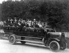 Group on an excursion. Durham Churchill charabanc W2935 owned by W.H. Gray