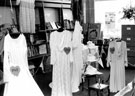 Display of wedding dresses at the 20 year anniversary of Newfield Green Library, Gleadless Road