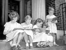 Young readers on the steps of Firth Park Branch Library, Firth Park Road