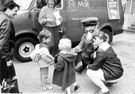 Children meeting Postman Pat outside Firth Park Branch Library,  Firth Park Road
