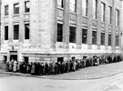 Central Library at junction of Tudor Street and Tudor Place, showing queue going into the Library Theatre on a Saturday afternoon to see a film show