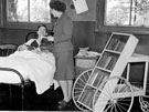 Hospital Library Service issuing books to a patient