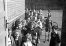 Children queueing at Manor Branch Library, Ridgeway Road