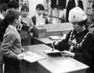 Lady Mayoress, Mrs Worrall discharging books for children after the opening of the Junior Library, Burngreave Library, Gower Street