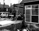 Erecting a side panel during the construction of Handsworth Library, Hendon Street, at junction of Hall Road
