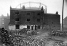 Demolition of back to back housing in Court No. 15, Arundel Street. Rear of former Gas Tank Tavern, No 293, Arundel Street, left. Arundel Street and Gasometer in background