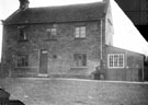 Rear view of Grange Cottage at unidentified location